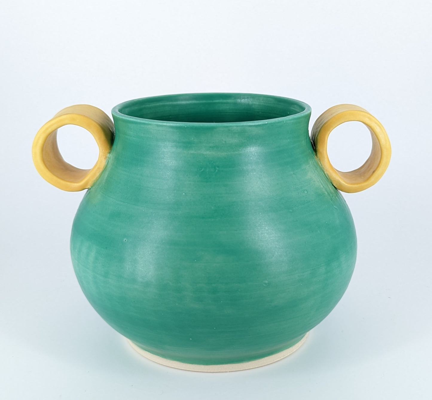 Pot with two ring side handles